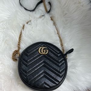 Black Gucci GG Marmont mini round crossbody shoulder bag